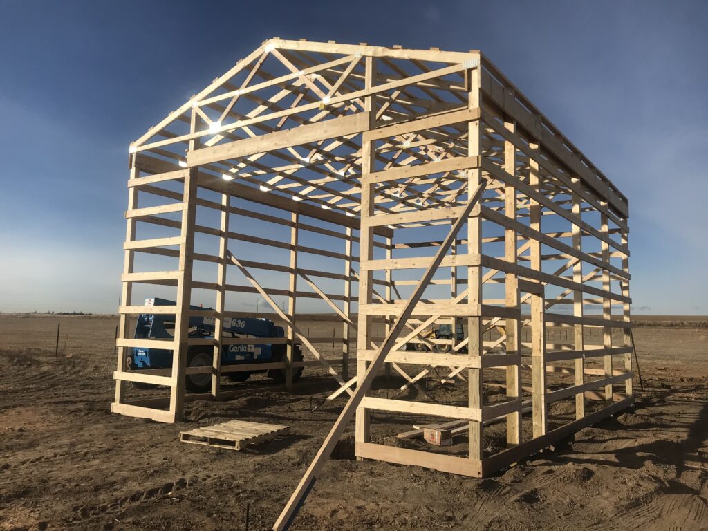 pole barn pricing - 24 x 32 pole barn being erected.